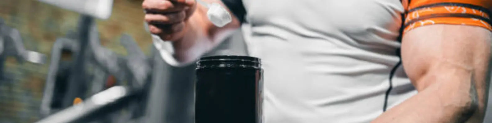 Man scooping protein powder