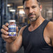 Andriol® androgen and testosterone support dietary supplement bottle held by fit athletic man in gym by Hi-Tech Pharmaceuticals