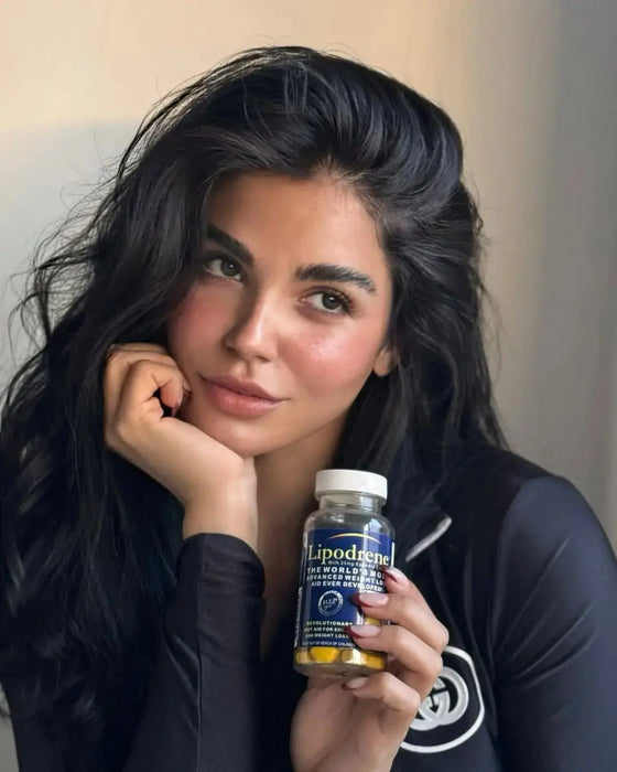 ipodrene® Ephedra-Based Weight Loss & Energy Supplement bottle (90 count) with yellow tablets, held by fitness model in black athletic wear by Hi-Tech Pharmaceuticals